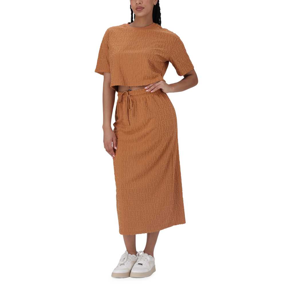 BONNIE DARK CARAMEL EMBOSSED LOGO SKIRT